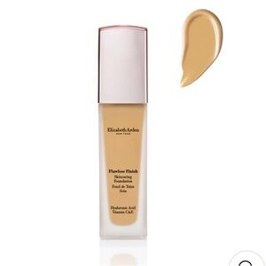 Elizabeth Arden Flawless Finish Skincaring Foundation. Color 140C. New in box.